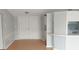 This living room features a view of the open kitchen and a set of double doors at 3802 Stern Dr., Conway, SC 29526