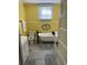 Charming bathroom featuring a clawfoot tub, toilet and vanity at 402 Gibson St., Marion, SC 29571