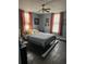 Bedroom with hardwood floors and black metal frame bed at 402 Gibson St., Marion, SC 29571