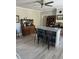 Kitchen with kitchen island with seating, display cabinets, and wood floors at 402 Gibson St., Marion, SC 29571