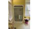 A shower stall in a bathroom with yellow walls, featuring glass doors and a view of a pink laundry basket at 402 Gibson St., Marion, SC 29571