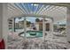Hot tub view under a pergola with a view of the pool, buildings, and marina at 4215 Coquina Harbour Dr. # D -2, Little River, SC 29566