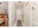 Inviting hallway with tile floor, neutral paint, and access to bedroom and closet at 4709 Wild Iris Dr. # 101, Myrtle Beach, SC 29577