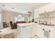 Well-lit kitchen seamlessly connects to living room, creating an inviting open floor plan at 4709 Wild Iris Dr. # 101, Myrtle Beach, SC 29577