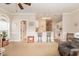 Inviting living room featuring breakfast bar, kitchen access, and comfortable furnishings at 4709 Wild Iris Dr. # 101, Myrtle Beach, SC 29577