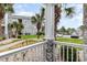Relaxing porch view of the well-maintained grounds and building exterior of community at 4709 Wild Iris Dr. # 101, Myrtle Beach, SC 29577