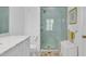 Clean bathroom with a marble countertop vanity and a glass enclosed shower with a built in seat at 486 Lantana Circle, Georgetown, SC 29440