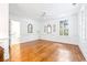 Bright bedroom with hardwood flooring, fresh walls, and a modern ceiling fan at 486 Lantana Circle, Georgetown, SC 29440