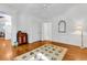 Bedroom with a ceiling fan, and a glimpse into an attached bath at 486 Lantana Circle, Georgetown, SC 29440