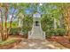 Charming two-story home with a welcoming front porch and meticulously maintained landscaping at 486 Lantana Circle, Georgetown, SC 29440