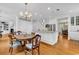 Open-concept kitchen with island, stainless appliances, and breakfast nook area, perfect for modern living at 486 Lantana Circle, Georgetown, SC 29440