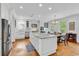 Bright kitchen with stainless appliances, marble countertops, and lots of natural light at 486 Lantana Circle, Georgetown, SC 29440