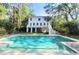 Back exterior featuring a beautiful pool, outdoor space, and the back of the home at 486 Lantana Circle, Georgetown, SC 29440