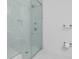 Modern bathroom with a large walk-in shower and sleek marble tiling at 486 Lantana Circle, Georgetown, SC 29440