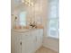 Bathroom featuring white vanity, granite countertops, and natural light at 618 6Th Ave. N, Surfside Beach, SC 29575