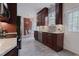 Kitchen features modern cabinets, stainless appliances, and a dining nook at 618 6Th Ave. N, Surfside Beach, SC 29575