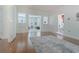 Inviting living room with hardwood floors, white trim, and views into other rooms at 618 6Th Ave. N, Surfside Beach, SC 29575