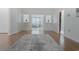 Bright, open-concept living room with hardwood floors and white trim at 618 6Th Ave. N, Surfside Beach, SC 29575