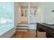 Office space with hardwood floors, built-in shelving, and natural light at 618 6Th Ave. N, Surfside Beach, SC 29575