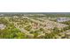 Community aerial view shows a home located within a neighborhood with mature trees and a pond at 706 Birch Ln., Conway, SC 29526