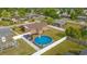 Backyard aerial view shows an above-ground pool and spacious yard enclosed by a privacy fence at 706 Birch Ln., Conway, SC 29526