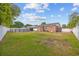 Spacious backyard featuring a well-maintained lawn, vinyl fence, and an above-ground swimming pool at 706 Birch Ln., Conway, SC 29526