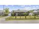 Charming single-story home with a well-manicured lawn and mature landscaping creating curb appeal at 706 Birch Ln., Conway, SC 29526