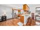 Updated kitchen featuring a stainless steel refrigerator, and a convenient breakfast bar area at 706 Birch Ln., Conway, SC 29526