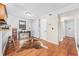 Bright living room showcasing wood floors, a decorative cow-hide rug, and a neutral color palette at 706 Birch Ln., Conway, SC 29526
