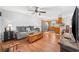 Open-concept living space featuring hardwood floors, and a seamless flow to the kitchen at 706 Birch Ln., Conway, SC 29526