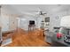 Open-concept living space featuring hardwood floors, a ceiling fan and access to hallway at 706 Birch Ln., Conway, SC 29526