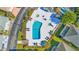 Aerial view of a community pool and lounging area, surrounded by manicured landscaping at 820 9Th Ave. S, North Myrtle Beach, SC 29582