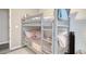 Cozy bedroom with gray bunk beds and soft, inviting bedding, creating a comfortable and playful space at 830 San Marco Ct. # 2603-B, Myrtle Beach, SC 29579