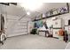 Well-organized garage with ample storage space, epoxy flooring, and room for vehicles at 830 San Marco Ct. # 2603-B, Myrtle Beach, SC 29579