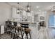 Open kitchen with a breakfast bar, granite countertops, and stylish pendant lighting at 830 San Marco Ct. # 2603-B, Myrtle Beach, SC 29579
