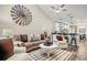Cozy living room features a ceiling fan, modern decor, and an open floor plan to the kitchen at 830 San Marco Ct. # 2603-B, Myrtle Beach, SC 29579