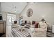 Spacious living room with high ceilings, stylish furniture, and ample natural light, perfect for entertaining at 830 San Marco Ct. # 2603-B, Myrtle Beach, SC 29579