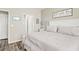 Serene main bedroom with soft natural light, featuring a view into the ensuite bathroom and walk-in closet at 830 San Marco Ct. # 2603-B, Myrtle Beach, SC 29579
