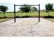 Community playground with swings and mulch, surrounded by green grass and trees at 830 San Marco Ct. # 2603-B, Myrtle Beach, SC 29579