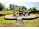Fun playground area with slides and various play structures surrounded by a safe, wood chip ground at 830 San Marco Ct. # 2603-B, Myrtle Beach, SC 29579