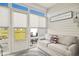 Cozy sunroom with ample natural light, comfortable seating, and views of the outdoor landscape at 830 San Marco Ct. # 2603-B, Myrtle Beach, SC 29579