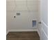 Laundry room featuring laminate floors and washer-dryer hookups at 958 Oak Hollow St., Longs, SC 29568