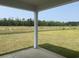 Enjoy outdoor living on this large, landscaped lot with a covered patio overlooking a peaceful green space at 962 Oak Hollow St., Longs, SC 29568