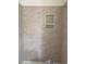 Tiled shower with built-in shelving at 962 Oak Hollow St., Longs, SC 29568