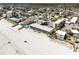 Aerial view of oceanfront resort featuring pools, convenient parking, and nearby neighborhoods at 1 Norris Dr. # 210, Pawleys Island, SC 29585