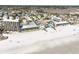 Expansive aerial view of oceanfront resort with private beach access and outdoor pool at 1 Norris Dr. # 210, Pawleys Island, SC 29585
