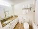 Bright bathroom with granite vanity top and ample storage at 1 Norris Dr. # 210, Pawleys Island, SC 29585