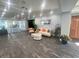 Bright lobby area with comfortable seating, modern tables, and tasteful decor at 1 Norris Dr. # 210, Pawleys Island, SC 29585