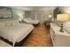 Comfortable room with two beds, neutral colors, and stylish decor at 1 Norris Dr. # 210, Pawleys Island, SC 29585