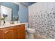 Bright bathroom featuring a vanity, toilet, and shower with curtain at 100 Birch N Coppice Dr. # 12, Surfside Beach, SC 29575
